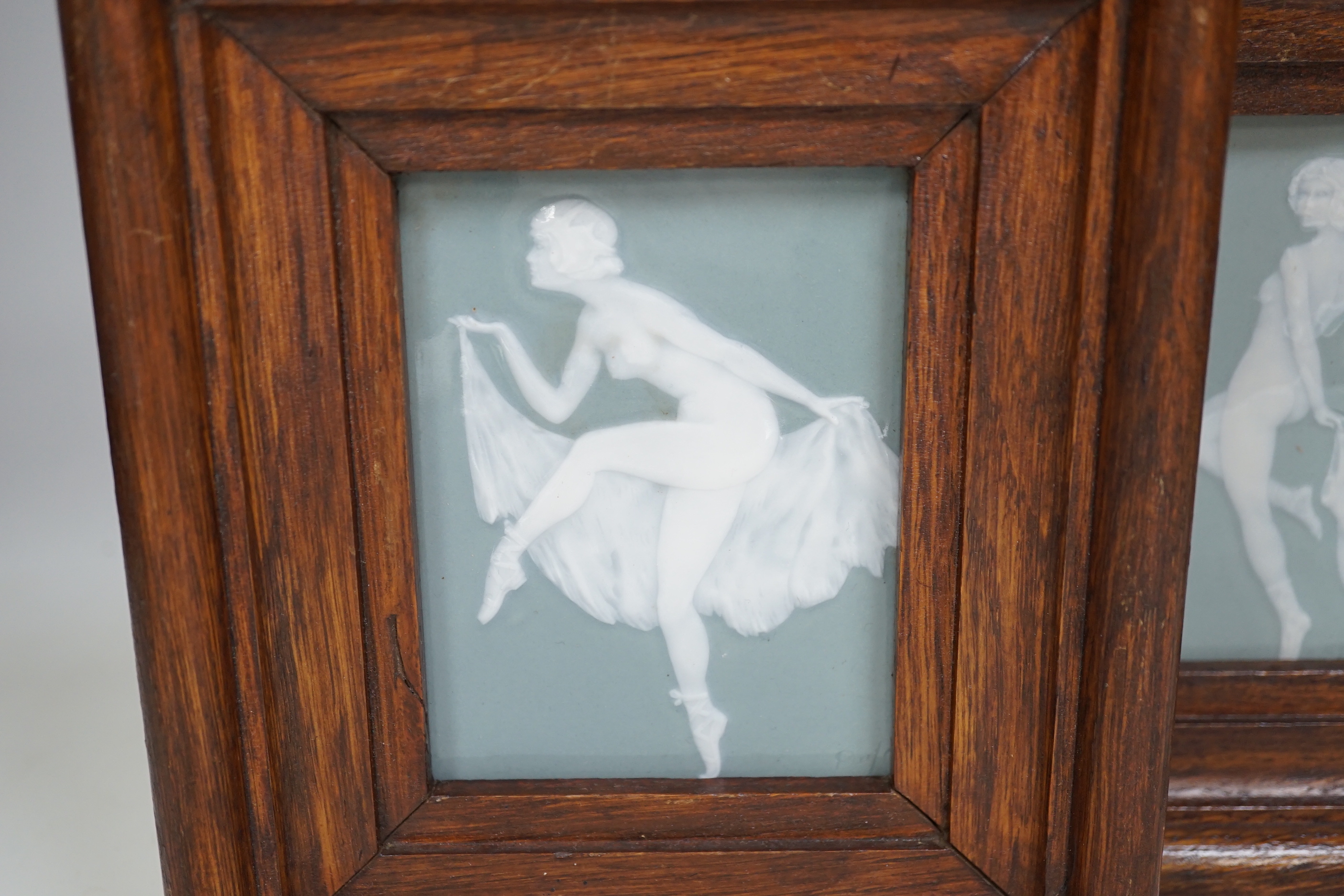 Two French pate-sur-pate panels of dancers, each signed Dufaud, framed, the largest overall 20cm x 17cm
